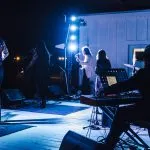 A band performs on stage