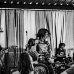 A band performs on stage